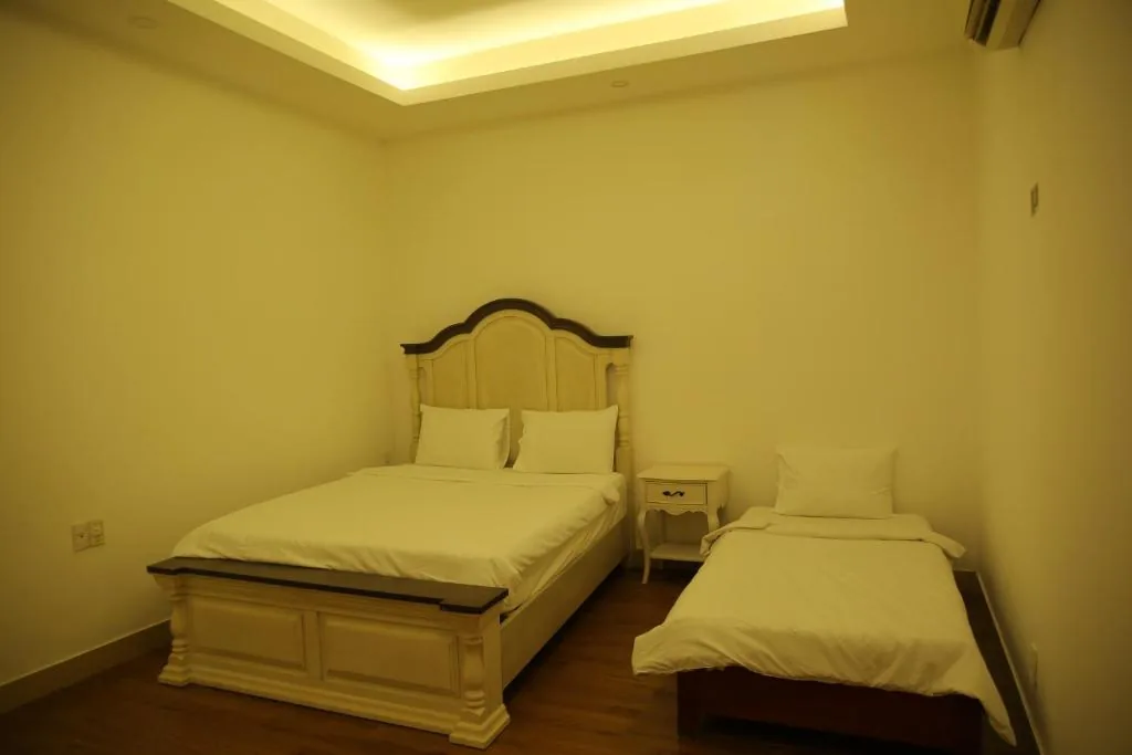 Deluxe Triple Room — Violet Star Hotel and Spa